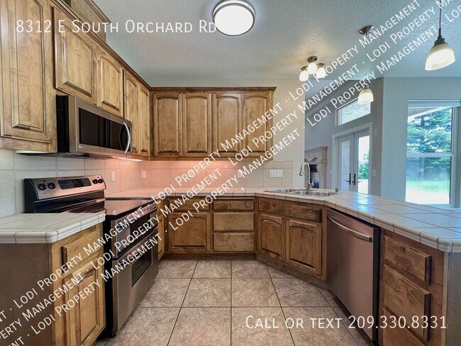 Building Photo - 8312 E Orchard Rd
