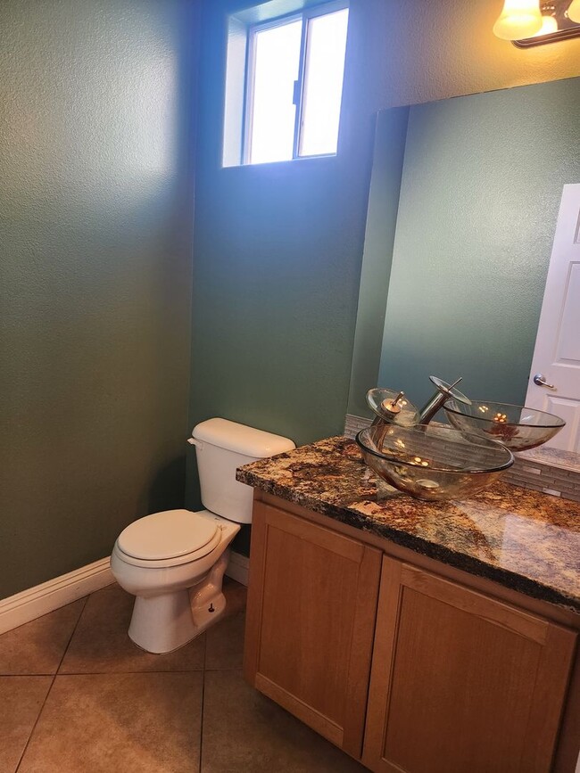Building Photo - Rhodes Ranch 4 Bed Home | Guard-Gated Community | Trash & Sewer Included