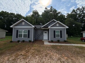 Building Photo - New home on great street!