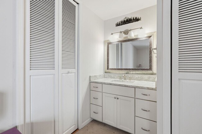 Building Photo - This beautifully refreshed condominium offers a refined blend of style and comfort