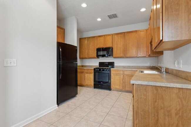 Building Photo - VICTORIA PARK TOWNHOUSE DEED RESTRICTED AREA WITH MANY AMENITIES AVAILABLE NOW