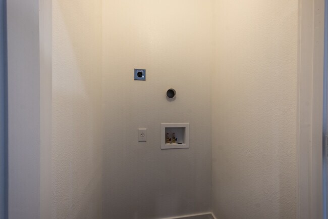 Building Photo - South Austin 2BR Condo with Balcony & Luxury Amenities