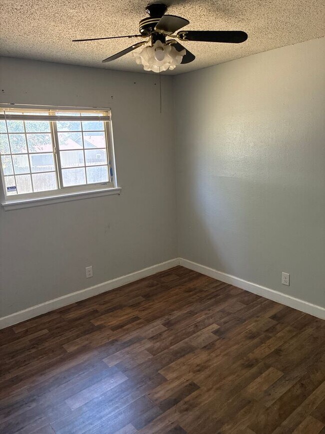 Building Photo - Welcome to this beautiful 4-bedroom, 2-bat...