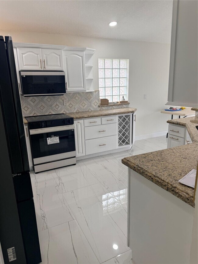 Building Photo - 3380 NW 78th Ave