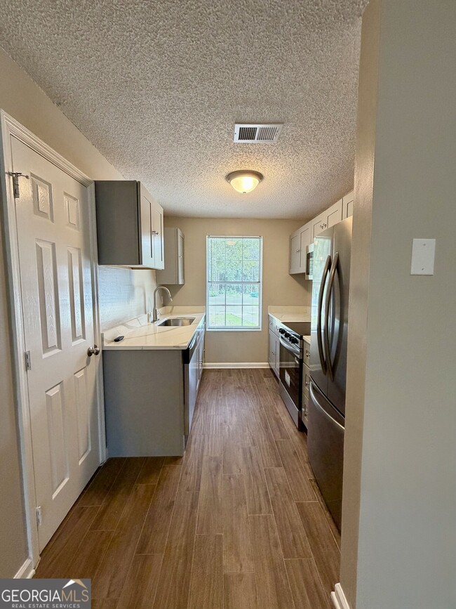 Building Photo - 440 Admiral's Walk Dr