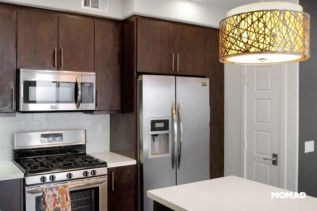 Building Photo - Luxury Townhome in Solaire/Old Creek Ranch...