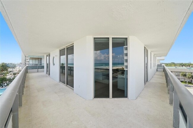 Building Photo - 5801 Collins Ave