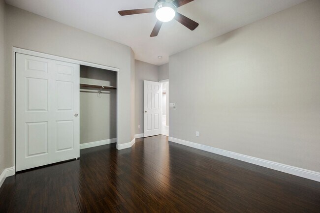 Building Photo - Single Story w/ duel primary suites gated ...