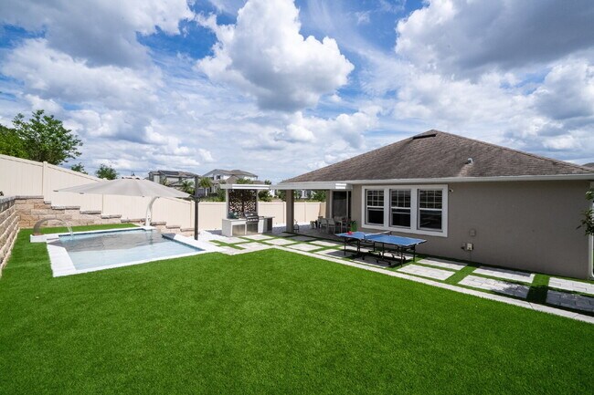 Building Photo - "Spacious 4-Bedroom Retreat with 3 Full Baths in Winter Garden's Serene Sanctuary"