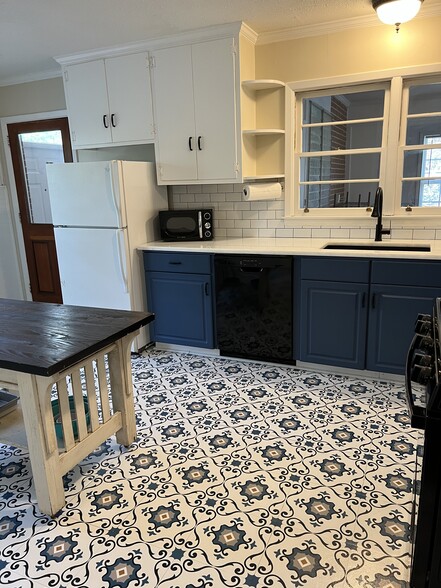 Kitchen with Butcher block Island - 203 Woodland Dr
