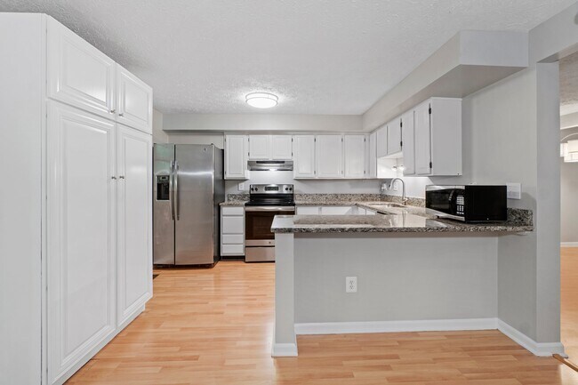 Building Photo - 7935 Tyson Oaks Cir