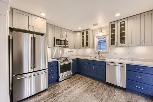Building Photo - Beautiful Remodeled House with Fenced Yard in Maple Leaf