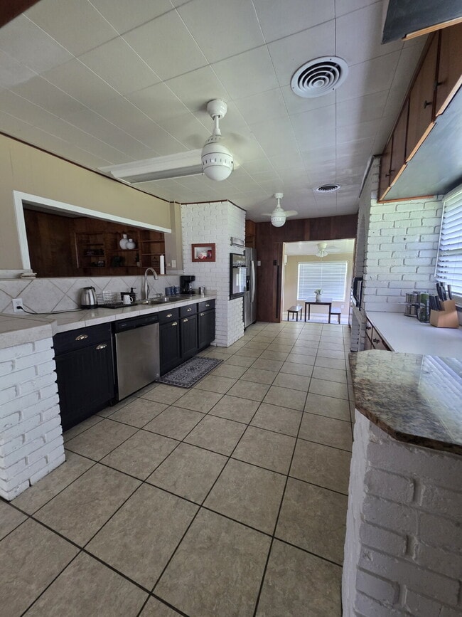 Building Photo - Need a mother-in-law suite or a kid cave?