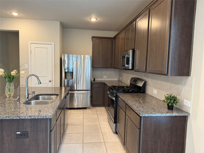 Building Photo - 8711 Windsong Trail Dr