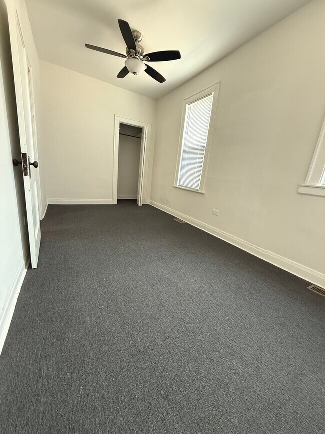 Building Photo - 9237 S Paxton Ave