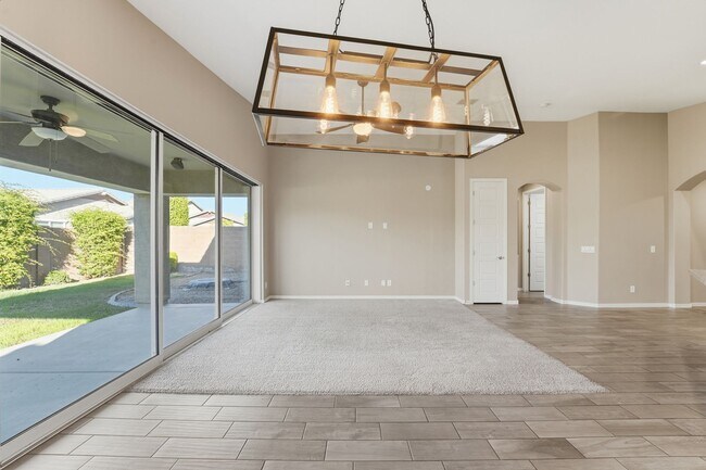Building Photo - Stunning 4-Bed + Den Eastmark Home with Modern Upgrades Throughout