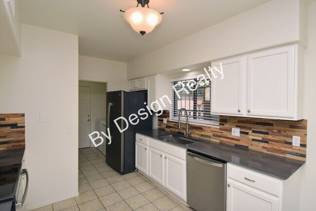 Building Photo - Updated SE Tucson 3BR/2.5BA Gem: Cathedral Ceilings & Private Wash Views