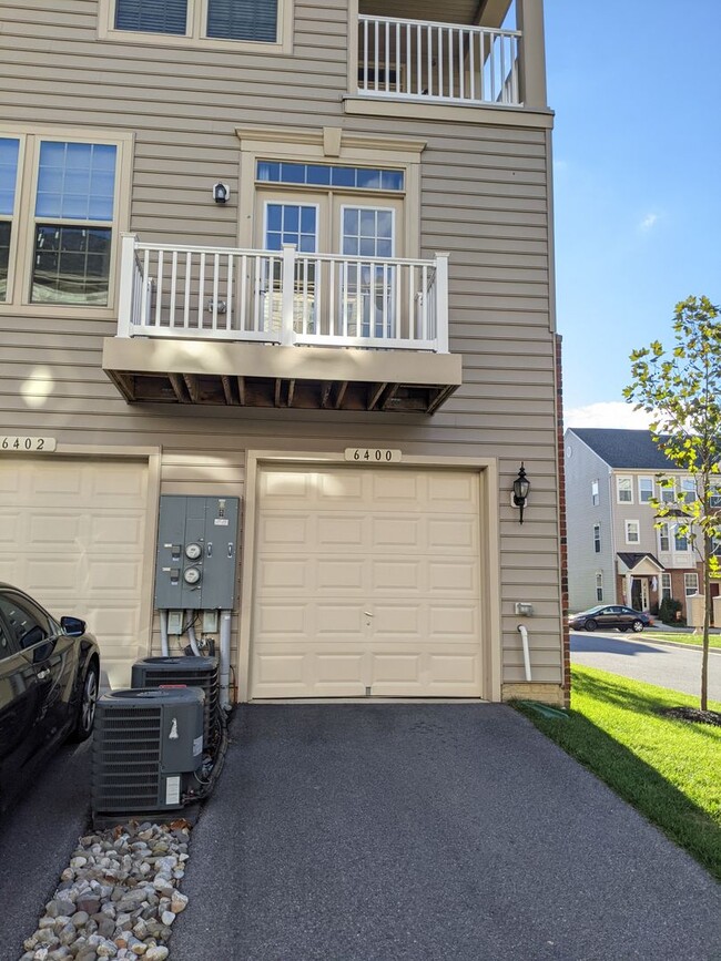 Building Photo - Bottom level (two story) *END UNIT* condo ...