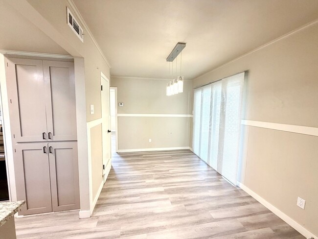 Building Photo - Stylish Two-Story Duplex with Loft, Fireplace & Private Backyard in New Braunfels!