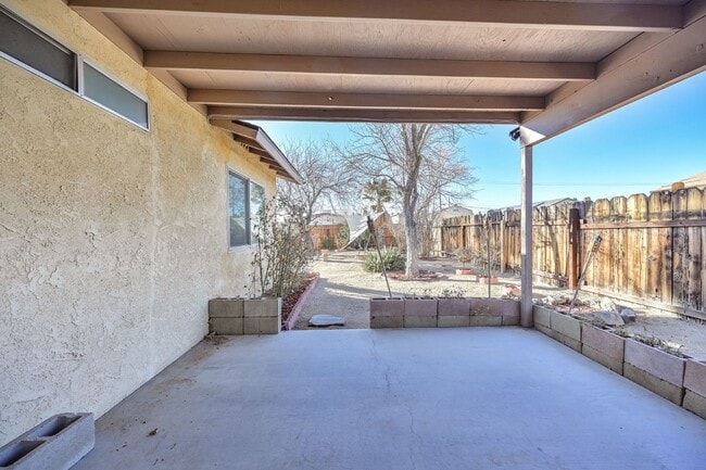 Building Photo - 3 bedroom, 2 bath with large living room and brick fireplace.  Good size kitchen with tons of cab...