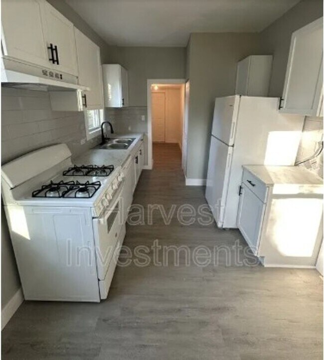 Building Photo - Welcome to Your Next Home with Harvest Investments!