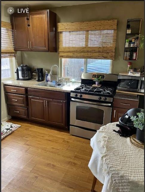 Kitchen has all stainless steel appliances - 163 California Ave