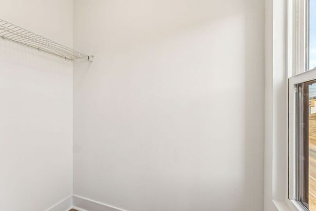 Building Photo - High-End 2BR Townhome | Rooftop Terrace + 2-Car Garage | 24-Unit Community