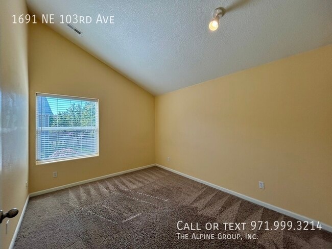 Building Photo - 1691 NE 103rd Ave
