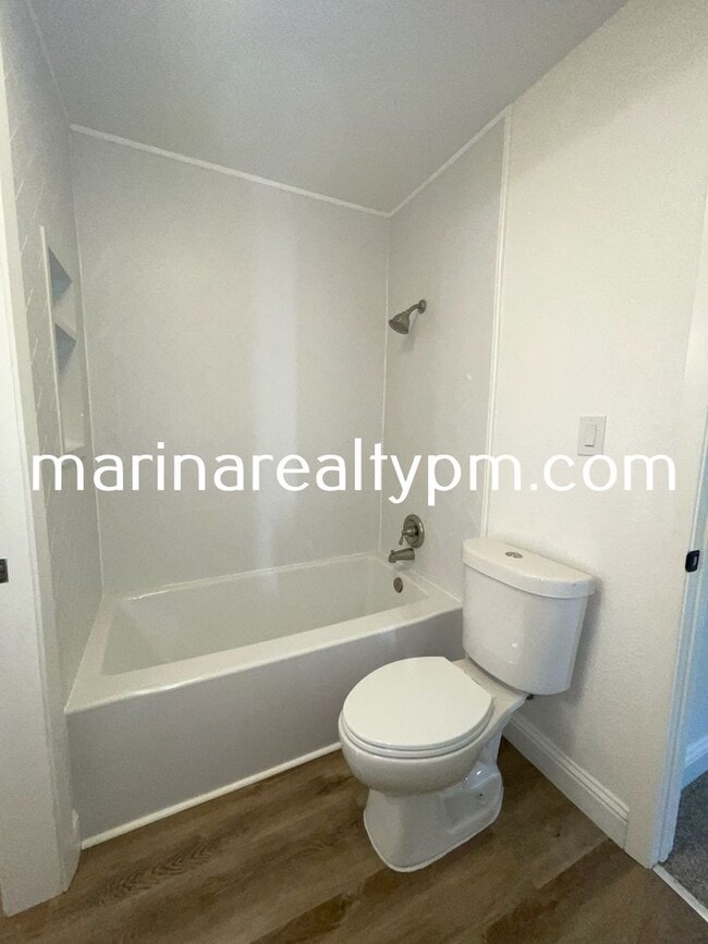 Building Photo - Two Story Crockett Condo Two-Off Street Pa...