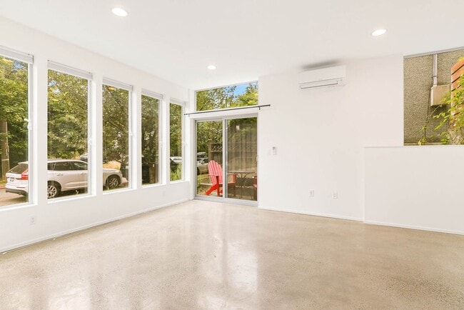 Building Photo - 3 Bedroom Modern Industrial Townhome with City Views & Rooftop Oasis