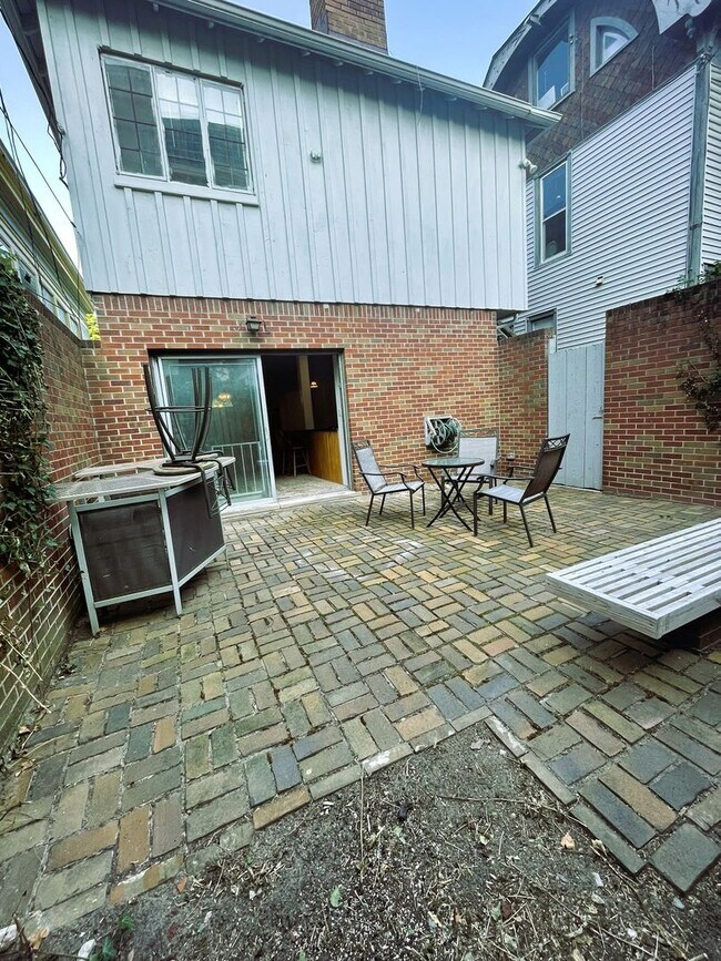 Building Photo - One Block to the Diag! Charming Home with Private Courtyard + Parking