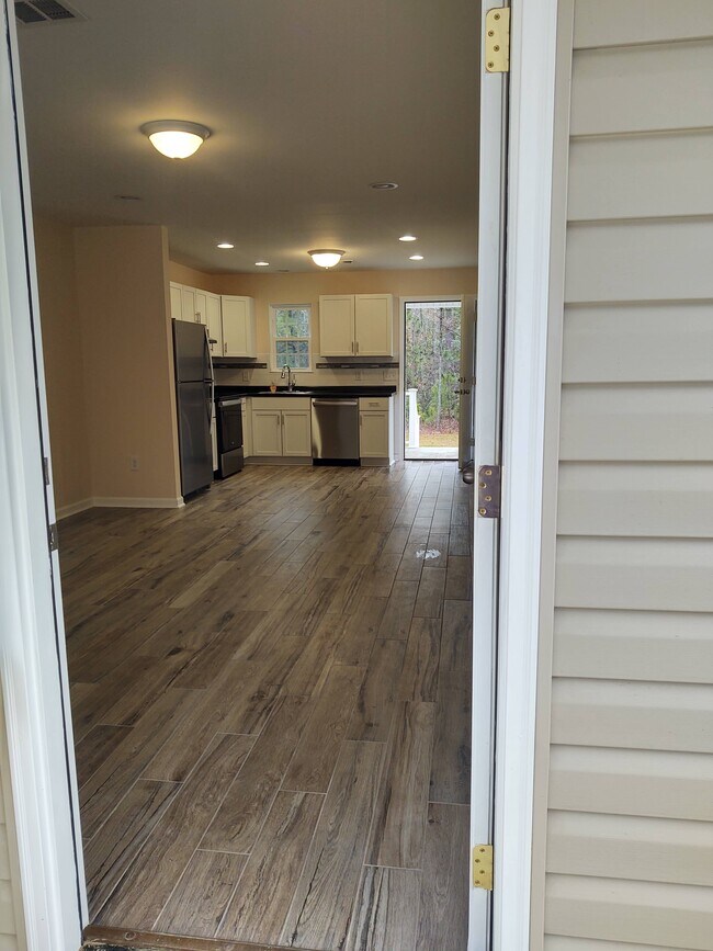 Living room and dining area - 230 E Meadowlake Pky