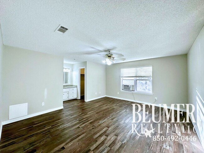 Building Photo - Charming Corner Haven 4BR/3BA Brick Home for Rent