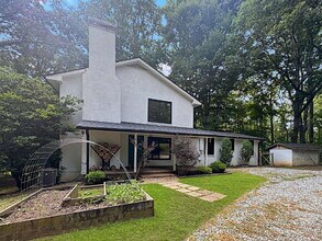 Building Photo - Modern Lake Lanier Retreat | 3BR/3.5BA | Private Swim Dock
