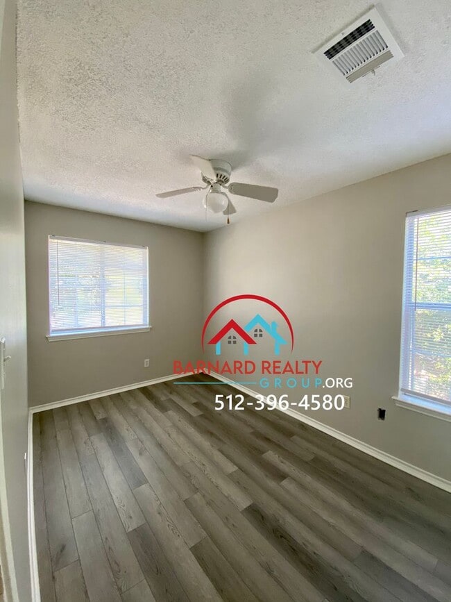 Building Photo - Available July 11: 3 bedroom, 2.5 Bath Duplex with Garage and Fenced Yard