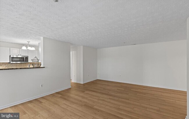 Building Photo - Welcome to Piney Orchard! This beautifully updated 2-bedroom, 2-bath condominium!