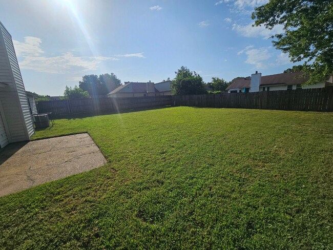 Building Photo - PREMIUM RENTAL! 3BR/2BA | Stone Fireplace & Hardwoods | Fenced Yard!