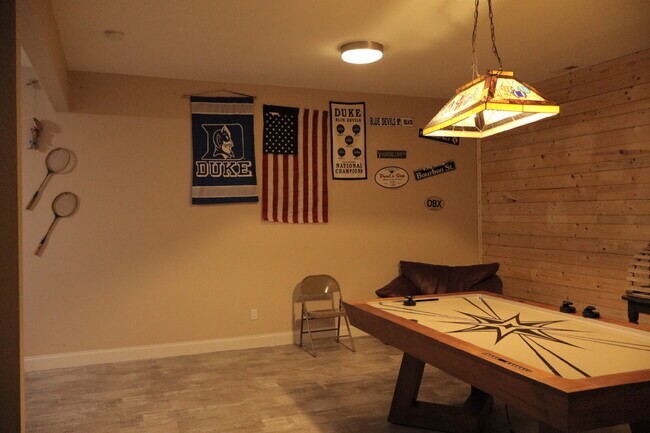 Building Photo - Expansive Mostly-Furnished Residence featuring 3 Bedrooms, a Completed Basement, and a Loft Space