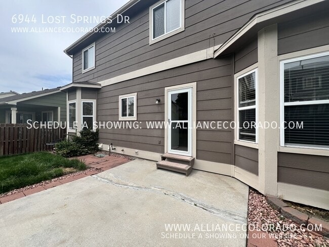 Building Photo - 6944 Lost Springs Dr