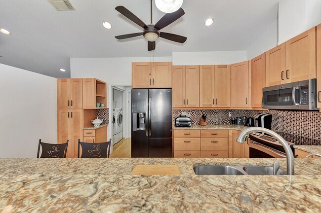 Building Photo - BEAUTIFUL 2 BEDROOM 2 BATHROOM + A DEN VILLA WITH GORGEOUS LAKE VIEWS!