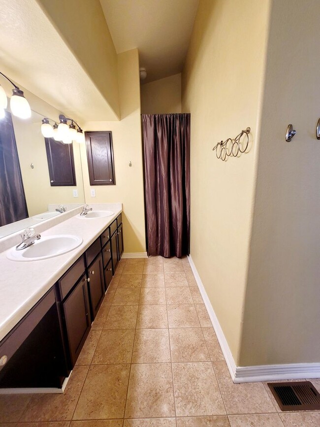 Building Photo - Boastful 3 Bedroom West Side home in gated...