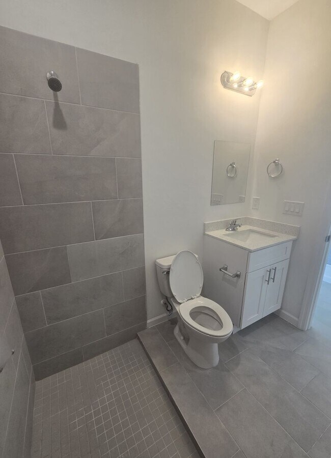 Building Photo - BRAND NEW-- TWO BEDROOM + TWO BATHROOMS- SOUTH LEHIGH ACRES