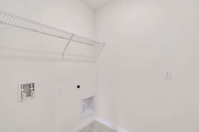 Building Photo - 4 bedrooms and 2 bathrooms, the spacious 1,828 sq ft home features an open concept with a 2 car g...