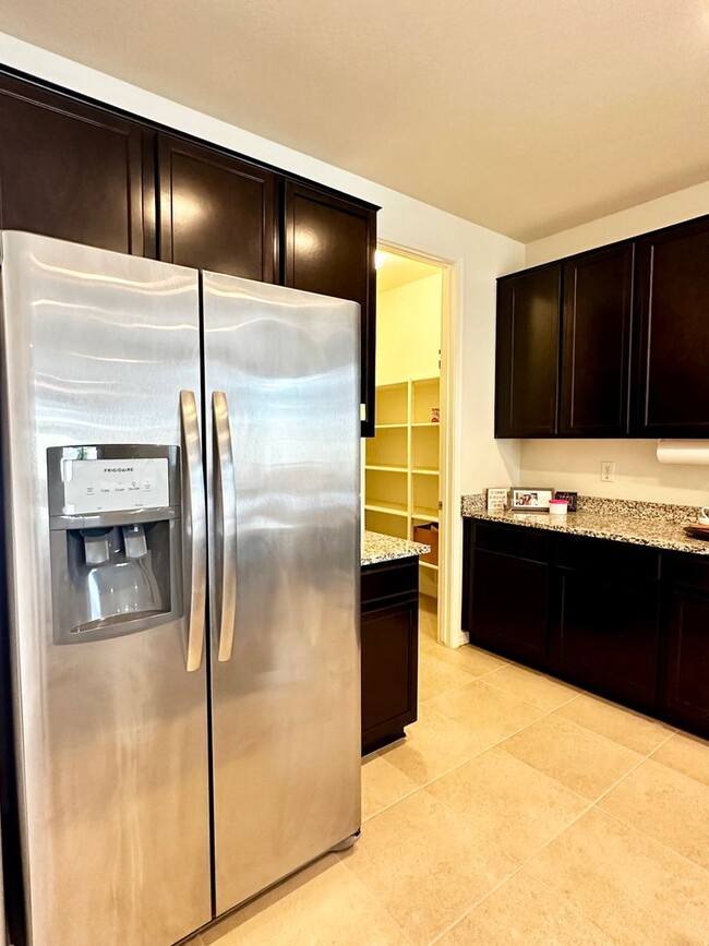 Building Photo - BEAUTIFUL VERRADO 3 BEDROOM PLUS DEN WITH ...