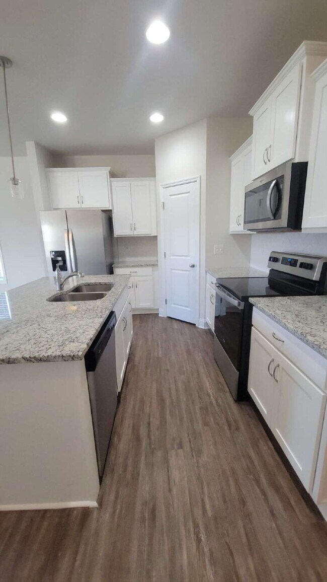 Building Photo - Coming Soon!!!  "Spacious 4-Bedroom Retrea...