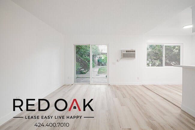 Building Photo - 211 S Ave 57