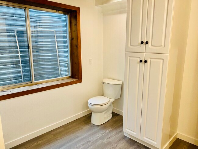 Downstairs bathroom with storage - 17065 Foxton Dr