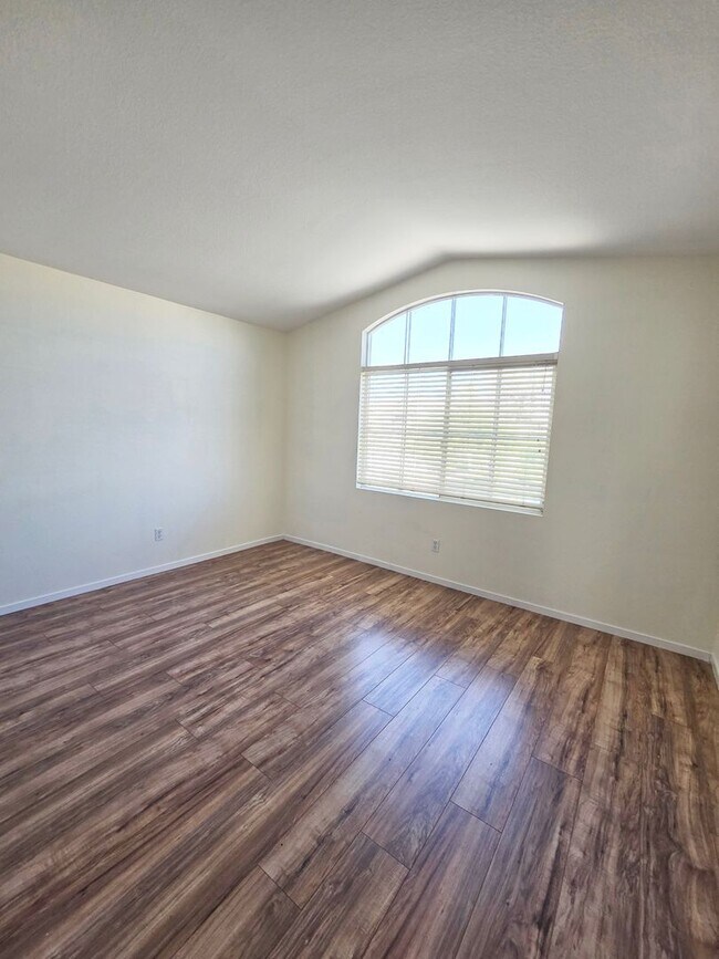 Building Photo - Spacious 4-Bedroom Corner Lot Home with Covered Patio