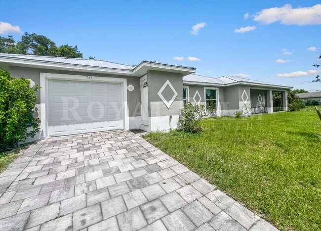 Building Photo - Spacious 3BR/2BA Duplex in Lehigh Acres & $500 Off Your First Month If You Apply by Aug 20th!