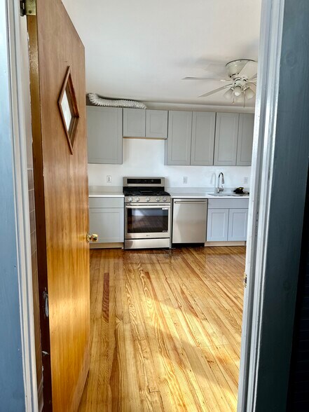 View of Kitchen from back stairwell. - 227 Hamilton Ave
